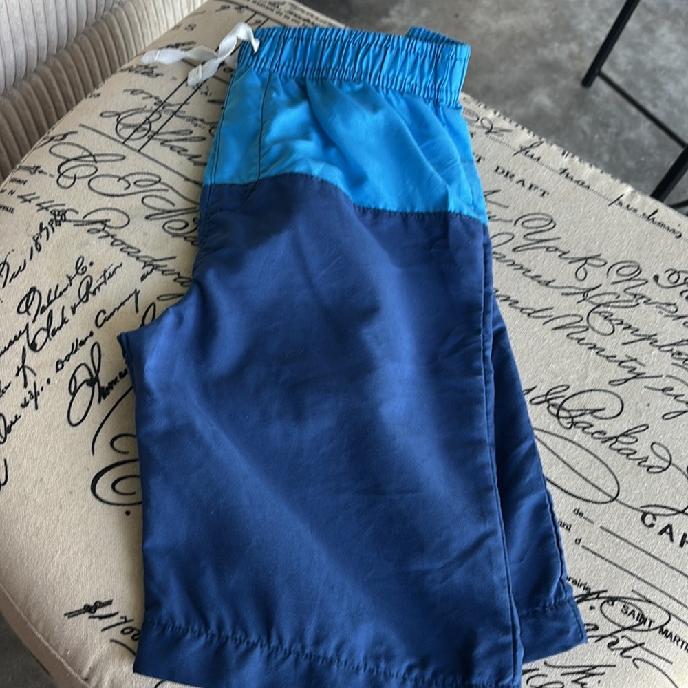 Blue Swim Trunks with Elastic Waistband and Lightweight Fabric